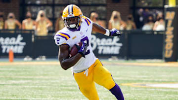 Oct 10, 2020; Columbia, Missouri, USA; LSU Tigers tight end Arik Gilbert (2) runs against the Missouri Tigers during the first half at Faurot Field at Memorial Stadium. Mandatory Credit: Jay Biggerstaff-USA TODAY Sports
