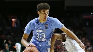 MIAMI, FLORIDA - JANUARY 19: Cameron Johnson #13 of the North Carolina Tar Heels drives to the basket against the Miami Hurricanes during the second half at Watsco Center on January 19, 2019 in Miami, Florida. (Photo by Michael Reaves/Getty Images)
