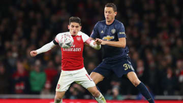 LONDON, ENGLAND - JANUARY 25: Lucas Torreira of Arsenal shields the ball from Nemanja Matic of Manchester United during the FA Cup Fourth Round match between Arsenal and Manchester United at Emirates Stadium on January 25, 2019 in London, United Kingdom. (Photo by Catherine Ivill/Getty Images)