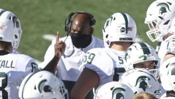 IOWA CITY, IOWA- NOVEMBER 7: Head coach Mel Tucker of the Michigan State Spartans talks to his team during a timeout in the first half against the Iowa Hawkeyes at Kinnick Stadium on November 7, 2020 in Iowa City, Iowa. (Photo by Matthew Holst/Getty Images)