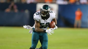 Sep 19, 2016; Chicago, IL, USA; Philadelphia Eagles linebacker Nigel Bradham (53) carries after making an interception during the second half against the Chicago Bears at Soldier Field. Philadelphia won 29-14. Mandatory Credit: Dennis Wierzbicki-USA TODAY Sports