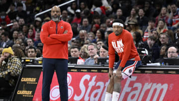 WASHINGTON, DC - FEBRUARY 11: Head coach Wes Unseld Jr. and Bradley Beal #3 of the Washington Wizards watch the game against the Indiana Pacers at Capital One Arena on February 11, 2023 in Washington, DC. NOTE TO USER: User expressly acknowledges and agrees that, by downloading and or using this photograph, User is consenting to the terms and conditions of the Getty Images License Agreement. (Photo by G Fiume/Getty Images)