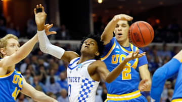 MEMPHIS, TN - MARCH 24: De'Aaron Fox #0 of the Kentucky Wildcats competes for the ball with Lonzo Ball #2 of the UCLA Bruins in the first half during the 2017 NCAA Men's Basketball Tournament South Regional at FedExForum on March 24, 2017 in Memphis, Tennessee. (Photo by Kevin C. Cox/Getty Images)