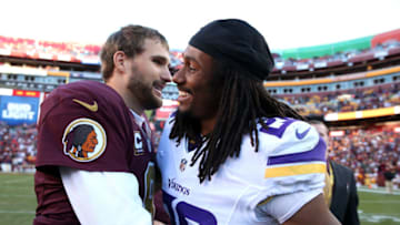 LANDOVER, MD - NOVEMBER 13: Quarterback Kirk Cousins #8 of the Washington Redskins meets with cornerback Trae Waynes #26 of the Minnesota Vikings after the Washington Redskins defeated the Minnesota Vikings 26-20 at FedExField on November 13, 2016 in Landover, Maryland. (Photo by Patrick Smith/Getty Images)