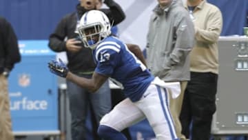 Oct 19, 2014; Indianapolis, IN, USA; Indianapolis Colts wide receiver T.Y. Hilton (13) runs after making a catch during the second quarter against the Cincinnati Bengals at Lucas Oil Stadium. Mandatory Credit: Pat Lovell-USA TODAY Sports