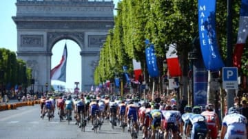 July 22, 2012; Paris, FRANCE; A general view of the peloton as riders make their way up the Champs Elysees towards the Arc de Triomphe during stage twenty of the 2012 Tour de France in Paris. Mandatory Credit: Bernard Papon/Presse Sports via USA TODAY Sports
