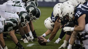 STATE COLLEGE, PA - DECEMBER 12: A general view of the Michigan State Spartans defensive line and the Penn State Nittany Lions offensive line as Chris Stoll #91 of the Penn State Nittany Lions prepares to snap the ball during the second half at Beaver Stadium on December 12, 2020 in State College, Pennsylvania. (Photo by Scott Taetsch/Getty Images)