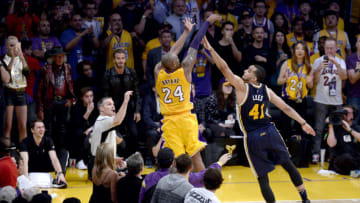 Kobe Bryant #24 of the Los Angeles Lakers shoots over Trey Lyles #41 of the Utah Jazz during the final game of his career on April 13, 2016 at Staples Center in Los Angeles, California. (Photo by Kevork Djansezian/Getty Images)