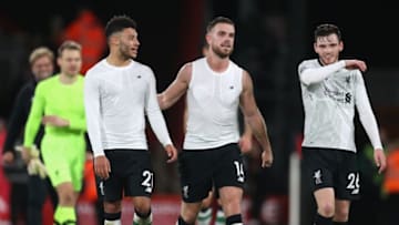 BOURNEMOUTH, ENGLAND - DECEMBER 17: Alex Oxlade-Chamberlain of Liverpool, Jordan Henderson, and Andy Robertson after the Premier League match between AFC Bournemouth and Liverpool at Vitality Stadium on December 17, 2017 in Bournemouth, England. (Photo by Catherine Ivill/Getty Images)