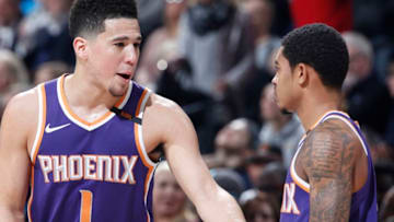 INDIANAPOLIS, IN - JANUARY 24: Devin Booker #1 and Tyler Ulis #8 of the Phoenix Suns talk during a game against the Indiana Pacers at Bankers Life Fieldhouse on January 24, 2018 in Indianapolis, Indiana. The Pacers won 116-101. NOTE TO USER: User expressly acknowledges and agrees that, by downloading and or using the photograph, User is consenting to the terms and conditions of the Getty Images License Agreement. (Photo by Joe Robbins/Getty Images)