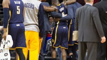 Feb 20, 2015; Philadelphia, PA, USA; Indiana Pacers guard Rodney Stuckey (2) is injured and helped off the court by team mates during the second half of a game against the Philadelphia 76ers at Wells Fargo Center. The Pacers defeated the 76ers 106-95. Mandatory Credit: Bill Streicher-USA TODAY Sports