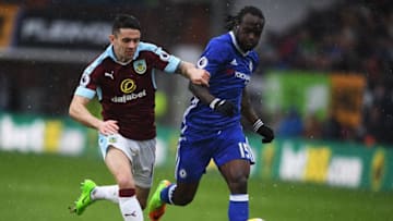 BURNLEY, ENGLAND - FEBRUARY 12: Roby Brady of Burnley and Victor Moses of Chelsea in action during the Premier League match between Burnley and Chelsea at Turf Moor on February 12, 2017 in Burnley, England. (Photo by Mike Hewitt/Getty Images)