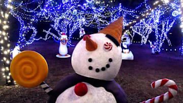 A confectionary snowman greets visitors within the United Way's Winter Lightfest Sunday. Nov. 20, 2022. The holiday tradition on E.N. 10th Street, east of Taylor Elementary School features a mile-long lighted walking trail and kicks off for the public Friday evening.