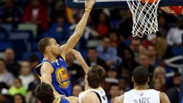 Jan 18, 2014; New Orleans, LA, USA; Golden State Warriors point guard Stephen Curry (30) shoots against the New Orleans Pelicans during the first half of a game at the New Orleans Arena. Mandatory Credit: Derick E. Hingle-USA TODAY Sports