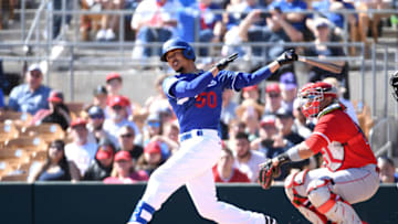 GLENDALE, ARIZONA - FEBRUARY 26: Mookie Betts #50 of the Los Angeles Dodgers follows through on a swing during a spring training game against the Los Angeles Angels at Camelback Ranch on February 26, 2020 in Glendale, Arizona. (Photo by Norm Hall/Getty Images)