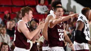 Jan 16, 2016; Athens, GA, USA; Texas A&M Aggies players including guard T.J. Distefano (33) react near the end of the game against the Georgia Bulldogs during the second half at Stegeman Coliseum. Texas A&M defeated Georgia 79-45. Mandatory Credit: Dale Zanine-USA TODAY Sports