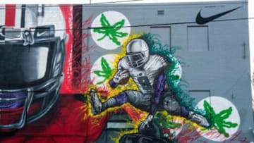 Jan 15, 2015; Dallas, TX, USA; A view of the Nike mural depicting the Oregon Ducks and Ohio State Buckeyes football teams. The mural was painted by artist Mark Paul Deren during the college football playoffs weekend in Dallas, TX. Mandatory Credit: Jerome Miron-USA TODAY Sports