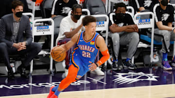 Isaiah Roby #22 of the Oklahoma City Thunder handles the ball against the Phoenix Suns during the NBA game at Phoenix Suns Arena on April 02, 2021 in Phoenix, Arizona. The Suns defeated the Thunder 140-103. NOTE TO USER: User expressly acknowledges and agrees that, by downloading and or using this photograph, User is consenting to the terms and conditions of the Getty Images License Agreement. (Photo by Christian Petersen/Getty Images)