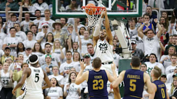 EAST LANSING, MI - NOVEMBER 30: Miles Bridges #22 of the Michigan State Spartans dunks the ball during the game against the Notre Dame Fighting Irish at Breslin Center on November 30, 2017 in East Lansing, Michigan. (Photo by Rey Del Rio/Getty Images)