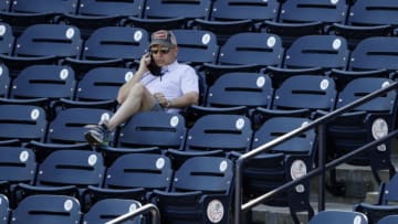 Feb 24, 2021; Tampa, Florida, USA; New York Yankees general manager Brian Cashman looks on during spring training workouts at George M. Steinbrenner Field. Mandatory Credit: Kim Klement-USA TODAY Sports