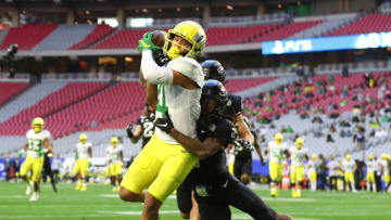 Auburn footballJan 2, 2021; Glendale, AZ, USA; Oregon Ducks wide receiver Mycah Pittman (4) against the Iowa State Cyclones in the Fiesta Bowl at State Farm Stadium. Mandatory Credit: Mark J. Rebilas-USA TODAY Sports