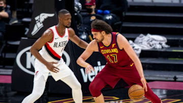 CLEVELAND, OH - MAY 5: Anderson Varejao #17 of the Cleveland Cavaliers pushes past Harry Giles III #4 of the Portland Trail Blazers at Rocket Mortgage Fieldhouse on May 5, 2021 in Cleveland, Ohio. The Portland Trail Blazers beat the Cleveland Cavaliers 141-105. NOTE TO USER: User expressly acknowledges and agrees that, by downloading and or using this photograph, User is consenting to the terms and conditions of the Getty Images License Agreement. (Photo by Lauren Bacho/Getty Images)
