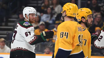 Arizona Coyotes left wing Lawson Crouse (67) celebrates after a goal during the second period against the Nashville Predators at Bridgestone Arena. Mandatory Credit: Christopher Hanewinckel-USA TODAY Sports