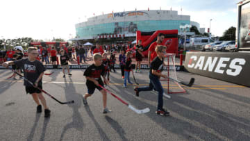 RALEIGH, NORTH CAROLINA - MAY 14: Carolina Hurricanes fans gather outside of the arena prior to Game Three between the Boston Bruins and the Carolina Hurricanes in the Eastern Conference Finals during the 2019 NHL Stanley Cup Playoffs at PNC Arena on May 14, 2019 in Raleigh, North Carolina. (Photo by Bruce Bennett/Getty Images)