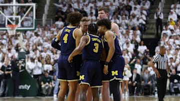 EAST LANSING, MI - MARCH 09: Zavier Simpson #3 of the Michigan Wolverines and his teammates prepare prior to the game against the Michigan State Spartans at Breslin Center on March 9, 2019 in East Lansing, Michigan. (Photo by Gregory Shamus/Getty Images)