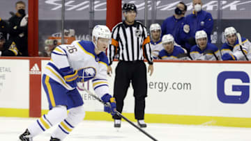 May 6, 2021; Pittsburgh, Pennsylvania, USA; Buffalo Sabres defenseman Rasmus Dahlin (26) handles the puck against the Pittsburgh Penguins during the second period at PPG Paints Arena. Mandatory Credit: Charles LeClaire-USA TODAY Sports