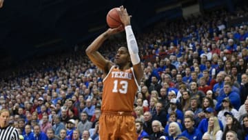 LAWRENCE, KANSAS - JANUARY 14: Jase Febres #13 of the Texas Longhorns shoos against the Kansas Jayhawks at Allen Fieldhouse on January 14, 2019 in Lawrence, Kansas. (Photo by Ed Zurga/Getty Images)