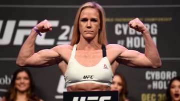 LAS VEGAS, NV - DECEMBER 29: Holly Holm poses on the scale during the UFC 219 weigh-in inside T-Mobile Arena on December 29, 2017 in Las Vegas, Nevada. (Photo by Jeff Bottari/Zuffa LLC/Zuffa LLC via Getty Images)