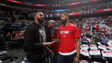 WASHINGTON, DC - APRIL 19: Marcus Morris #13 of the Detroit Pistons and Markieff Morris #5 of the Washington Wizards shake hands during Game Two of the Eastern Conference Quarterfinals during the 2017 NBA Playoffs on April 19, 2017 at Verizon Center in Washington, DC. NOTE TO USER: User expressly acknowledges and agrees that, by downloading and or using this Photograph, user is consenting to the terms and conditions of the Getty Images License Agreement. Mandatory Copyright Notice: Copyright 2017 NBAE (Photo by Stephen Gosling/NBAE via Getty Images)