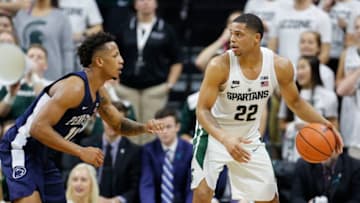 EAST LANSING, MI - JANUARY 31: Miles Bridges #22 of the Michigan State Spartans handles the ball while defended by Lamar Stevens #11 of the Penn State Nittany Lions at Breslin Center on January 31, 2018 in East Lansing, Michigan. (Photo by Rey Del Rio/Getty Images)