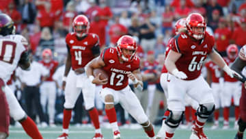 LOUISVILLE, KY - SEPTEMBER 29: Trey Smith #12 of the Louisville Cardinals runs with the ball against the Florida State Seminoles in the third quarter of the game at Cardinal Stadium on September 29, 2018 in Louisville, Kentucky. Florida State came from behind to win 28-24. (Photo by Joe Robbins/Getty Images)