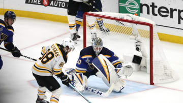 ST LOUIS, MISSOURI - JUNE 09: David Pastrnak #88 of the Boston Bruins scores a third period goal past Jordan Binnington #50 of the St. Louis Blues in Game Six of the 2019 NHL Stanley Cup Final at Enterprise Center on June 09, 2019 in St Louis, Missouri. (Photo by Jamie Squire/Getty Images)