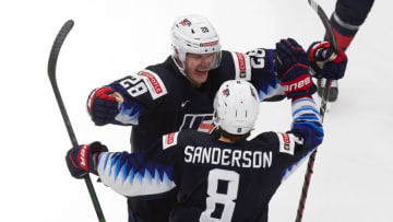 EDMONTON, AB - JANUARY 04: Arthur Kaliyev #28 and Jake Sanderson #8 of the United States celebrate a goal against Finland during the 2021 IIHF World Junior Championship semifinals at Rogers Place on January 4, 2021 in Edmonton, Canada. (Photo by Codie McLachlan/Getty Images)