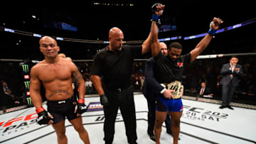 ATLANTA, GA - JULY 30: (R-L)Tyron Woodley celebrates his knockout victory over Robbie Lawler in their welterweight championship bout during the UFC 201 event on July 30, 2016 at Philips Arena in Atlanta, Georgia. (Photo by Jeff Bottari/Zuffa LLC/Zuffa LLC via Getty Images)