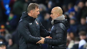Manchester City's Spanish manager Pep Guardiola (R) talks with Southampton's Austrian manager Ralph Hasenhuttl after the English League Cup fourth round football match between Manchester City and Southampton at the Etihad Stadium in Manchester, north west England, on October 29, 2019. - Manchester City won the match 3-1. (Photo by Lindsey Parnaby / AFP) / RESTRICTED TO EDITORIAL USE. No use with unauthorized audio, video, data, fixture lists, club/league logos or 'live' services. Online in-match use limited to 75 images, no video emulation. No use in betting, games or single club/league/player publications. / (Photo by LINDSEY PARNABY/AFP via Getty Images)