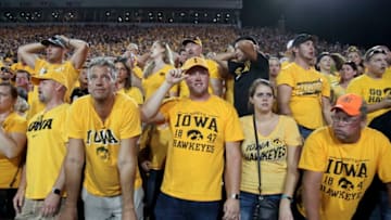 IOWA CITY, IOWA- SEPTEMBER 23: Iowa Hawkeyes fans react after a late touchdown in the fourth quarter against the Penn State Nittany Lions on September 23, 2017 at Kinnick Stadium in Iowa City, Iowa. (Photo by Matthew Holst/Getty Images) *** Local Caption ***