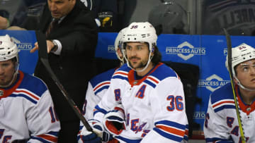 WINNIPEG, MB - FEBRUARY 11: New York Rangers Right Wing Mats Zuccarello (36) sits on the boards during a NHL game between the Winnipeg Jets and New York Rangers on February 11, 2018 at Bell MTS Centre in Winnipeg, MB. The Rangers defeated the Jets 3-1.(Photo by Nick Wosika/Icon Sportswire via Getty Images)