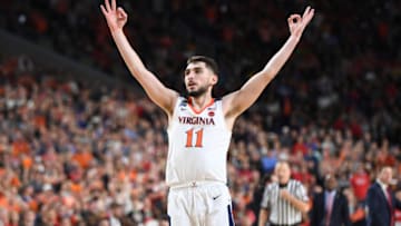 MINNEAPOLIS , MN - APRIL 8: Virginia Cavaliers guard Ty Jerome (11) reacts after making a shot at the end of the first half against Texas Tech during The National Championship game at U.S. Bank Stadium. (Photo by Jonathan Newton / The Washington Post via Getty Images)