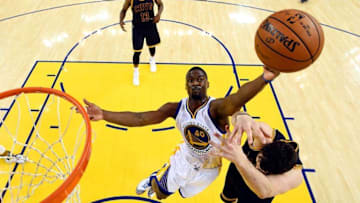 Jun 5, 2016; Oakland, CA, USA; Golden State Warriors forward Harrison Barnes (40) goes for a rebound against Cleveland Cavaliers forward Kevin Love (0) in game two of the NBA Finals at Oracle Arena. Mandatory Credit: Bob Donnan-USA TODAY Sports