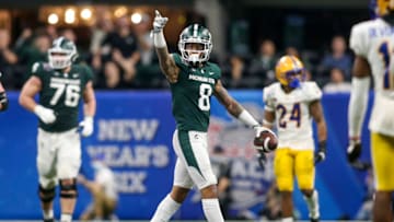 Dec 30, 2021; Atlanta, GA, USA; Michigan State Spartans wide receiver Jalen Nailor (8) celebrates after a first down against the Pittsburgh Panthers in the second half during the 2021 Peach Bowl at Mercedes-Benz Stadium. Mandatory Credit: Brett Davis-USA TODAY Sports