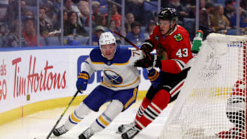 Apr 29, 2022; Buffalo, New York, USA; Buffalo Sabres left wing Victor Olofsson (71) skates behind the net as Chicago Blackhawks defenseman Alex Vlasic (43) defends during the second period at KeyBank Center. Mandatory Credit: Timothy T. Ludwig-USA TODAY Sports