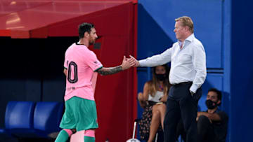 Lionel Messi of Barcelona shakes hands with Ronald Koeman, Manager of FC Barcelona. (Photo by David Ramos/Getty Images)