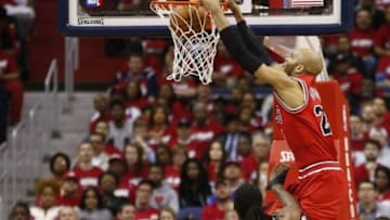 Apr 25, 2014; Washington, DC, USA; Chicago Bulls forward Taj Gibson (22) dunks the ball against the Washington Wizards in the second quarter in game three of the first round of the 2014 NBA Playoffs at Verizon Center. Mandatory Credit: Geoff Burke-USA TODAY Sports