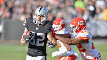 OAKLAND, CA - DECEMBER 02: Kansas City Chiefs Cornerback Orlando Scandrick (22), pushes Oakland Raiders Wide Receiver Jordy Nelson (82) you of bounds during the NFL game between the Kansas City Chiefs and the Oakland Raiders at the Oakland Alameda Coliseum in Oakland California on December 02, 2018. (Photo by Stephen Hopson/Icon Sportswire via Getty Images)