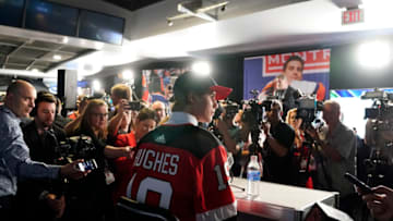 Jack Hughes speaks to the media after being selected first overall by the New Jersey Devils during the first round of the 2019 NHL Draft at Rogers Arena on June 21, 2019 in Vancouver, Canada. (Photo by Rich Lam/Getty Images)