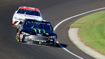 INDIANAPOLIS, IN - JULY 23: Kurt Busch, driver of the #41 Ford, leads Erik Jones, driver of the #77 Sport Clips Toyota, during the Monster Energy NASCAR Cup Series Brickyard 400 at Indianapolis Motorspeedway on July 23, 2017 in Indianapolis, Indiana. (Photo by Daniel Shirey/Getty Images)